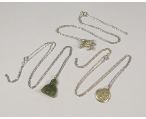 JADE ETC. A jade Buddha pendant with chain, a silver St. Christopher pendant with chain &amp; a Welsh dragon pendant &amp; ch