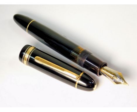 MONTBLANC. A Montblanc Meisterstuck 149 fountain pen. 14ct. yellow &amp; white gold Montblanc 4810 nib. Piston filled. A blac