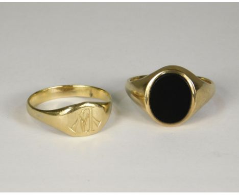 SIGNET RINGS. A 9ct. gold black onyx signet ring &amp; one other yellow metal signet ring, the back engraved 1914.