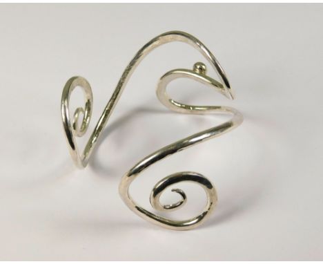SILVER BANGLE. A hand made silver bangle by John (Red) Simpson, St. Ives.