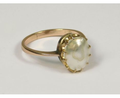 PEARL RING. An Arts &amp; Crafts 9ct. gold blister pearl dress ring.