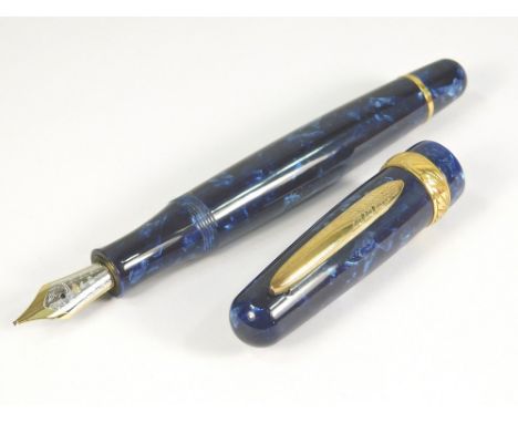 A Louis Vuitton fountain pen, with 18 carat white gold nib. 13.5cm