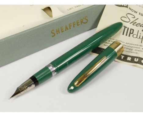 SHEAFFER. A Sheaffer Statesman fountain pen. Sheaffer wrap-around nib. A pastel green plastic pen c.1935 with snorkel filler.