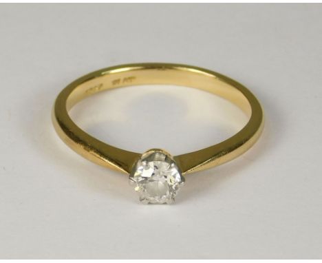 DIAMOND RING. An 18ct. gold solitaire diamond ring. The stone of approx. 0.25ct. spread. Size N.