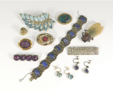 COSTUME JEWELLERY. A celluloid cicada brooch, a continental paste brooch, a cold painted copper enamel bracelet, a sterling s