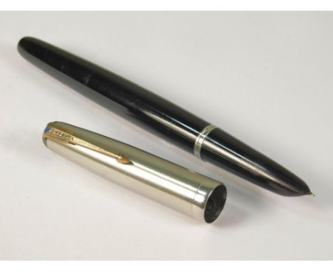 PARKER. A Parker 51 fountain pen. Hooded fine nib. A late 1946 plastic &amp; brushed stainless steel fountain pen with black 