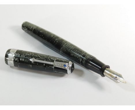 PARKER. A Parker Snr. Vacumatic Maxima fountain pen. Parker USA nib. 9. The 1930's silver pearl celluloid pen with button-fil