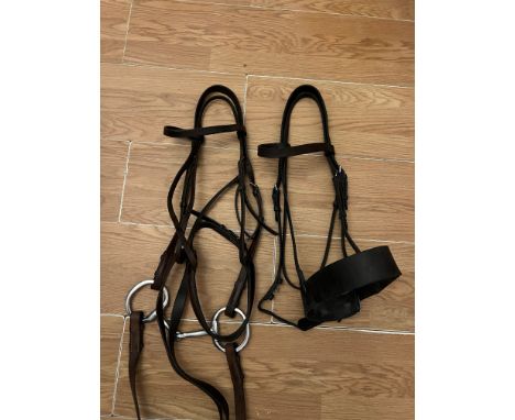 Two full size brown leather hunting bridles