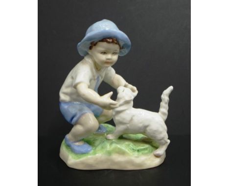 Royal Worcester "September" figurine #3457, a young boy with a cat, modelled by F.G. Doughty, height 12cm approx