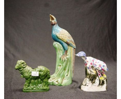 Three various Oriental animal form ceramic figures including: standing peacock on a branch, (damage to beak), (height 21cm ap