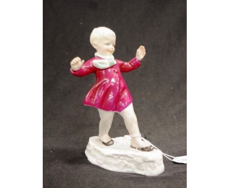 Royal Worcester "January" figurine #3452, a young boy dressed in winter clothes , modelled by F.G. Doughty, height 16cm appro