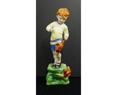 Royal Worcester "October" figurine #3417, a young boy playing with squirrels, modelled by F.G. Doughty, height 19cm approx