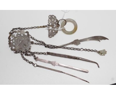 Chinese silver chatelaine on jade ring 5 various tool attached to floral centrepiece. (Silver untested)