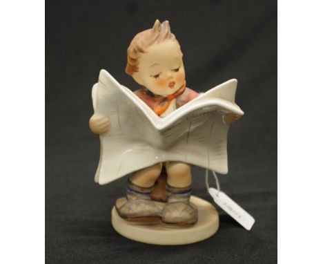 Goebel Hummel boy reading a newspaper height 12.5cm approx