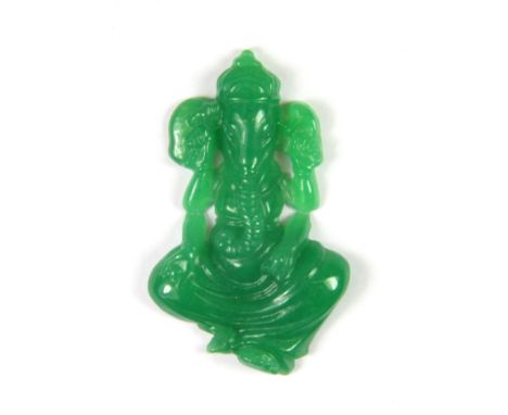 A carved Chinese apple green jade figure of the elephant God Ganesh. H. 5cms.