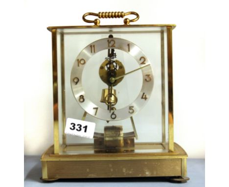 A 1970's electromagnetic mantle clock by Kieneger & Oberfel. H. 24cms. Prov. Swan Cottage, Thundersley, Essex.