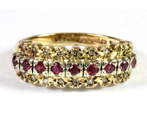 A 9ct yellow gold ruby and diamond ring (O.5).