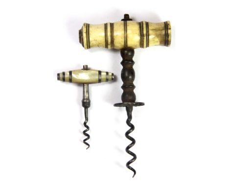 An early ivory mounted cork screw and a further mother of pearl cork screw.