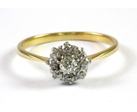 An antique yellow metal (tested 18ct gold) diamond cluster ring (R.5).