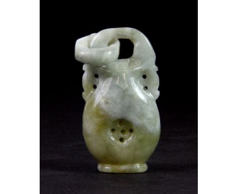 A Chinese carved nephrite jade amulet of a pierced vase with entegral ring, H. 5cms.