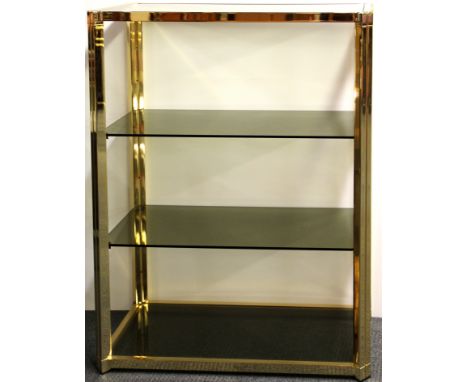 A gilt brass and smoked glass shelf unit, 82 x 27 x 115cm.