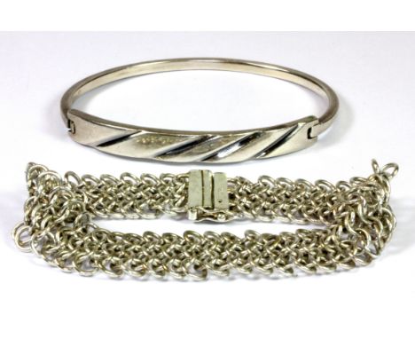 A 925 silver bracelet and a 925 silver bangle.