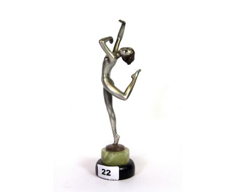 A original signed Art Deco Lorenzl metal figure on an onyx and marble base, H. 25cms.
