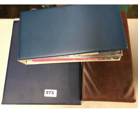 Three albums of mixed stamps and first day covers.