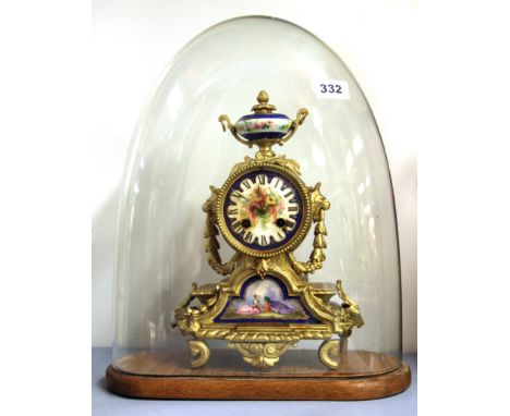 A 19th century French porcelain dial gilt spelter mantle clock under glass dome. H. 41cms.