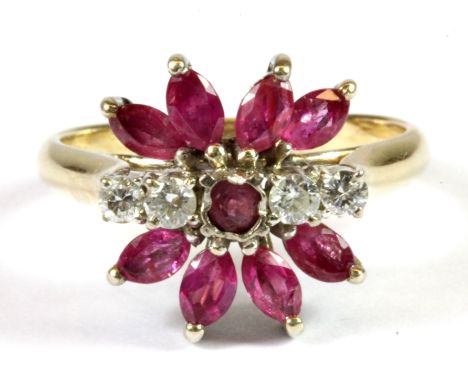 A 9ct yellow gold ruby and diamond set ring (Q).