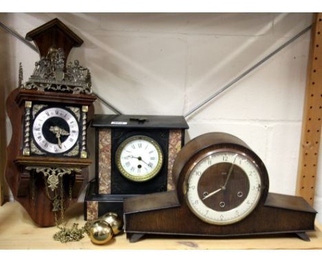 A Victorian slate mantle clock and a further mantle clock.