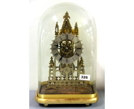 An 19th century brass skeleton clock by R. Donaldson, 8, Hinde Street, London W1 with five spoke wheelwork under glass dome. 