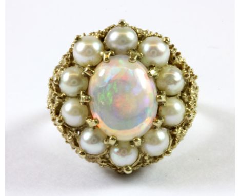 A yellow metal (tested minimum 9ct gold) opal and pearl ring (O.5).