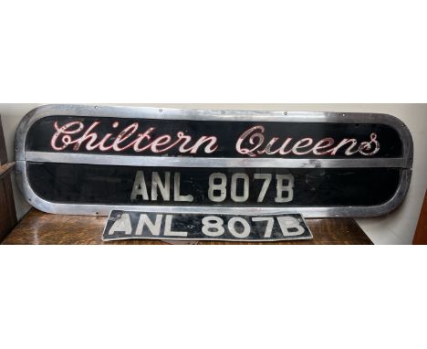 A Chiltern Queens Coach sign of oval form with an aluminium frame together with a number plate ANL 807B