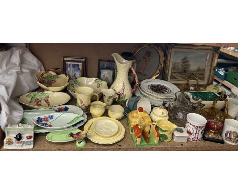 A collection of carltonware pottery including salad bowl and servers, jugs, cheese dish and cover etc