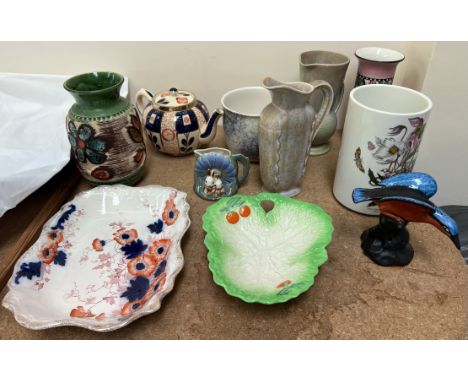 A Portmeirion Botanic Gardens utensil holder together with a Crown Devon jug and other jugs, Beswick ware dish, vases etc 