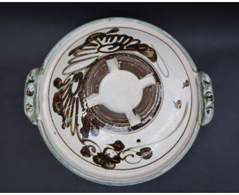 Attributed to Michael Cardew, a tureen and cover with scrolling decoration and twin handles, 28cm wide 
