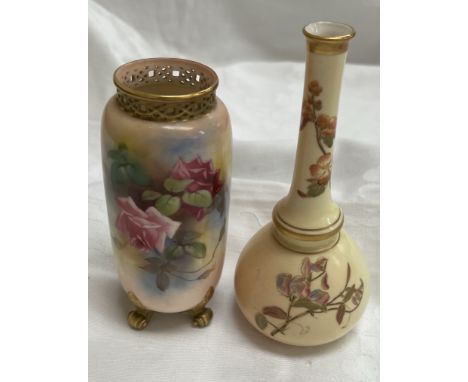 A Royal Worcester porcelain vase with a pierced rim, the body painted with roses and leaves to an ivory ground on gilt scroll