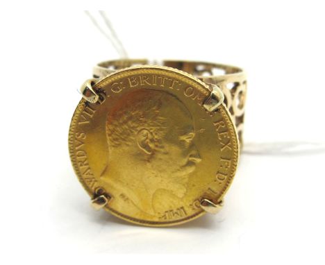 An Edward VII Half Sovereign, 1909, loose(?) claw set within openwork ring mount (finger size O) (overall weight 8.5grams). L