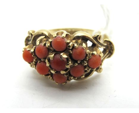 A 9ct Gold Coral Cluster Ring, claw set (finger size K) (2.7grams). 