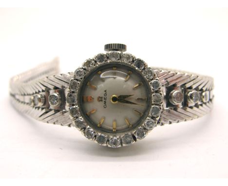 Omega; A Vintage Diamond Set Ladies Wristwatch, the signed dial with line markers, within diamond set bezel, the movement sta