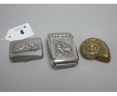 A Snuff Box, the hinged lid detailed with the 'Lucerne' lion, with reeded edge; Together with A Middle Eastern Vesta Case, de