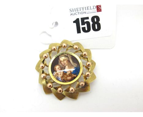 An Austrian Brooch / Pendant, the central ceramic plaque detailed with Madonna and child, within shaped and textured openwork