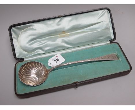 A Victorian Provincial Hallmarked Silver Ladle, John Stone, Exeter 1855, with circular shell bowl and bright cut engraved han