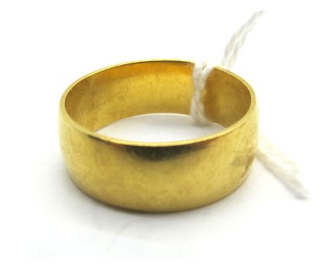 A 22ct Gold Wide Plain Wedding Band, (London 1967) (finger size O) (6.4grams). 