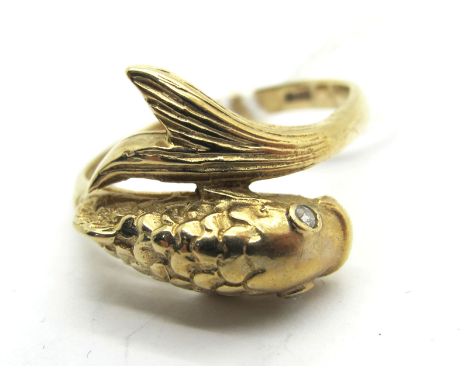 A Modern Dress Ring, as a fish, of textured finish with inset eyes, stamped "375" (finger size S) (3.4grams). 