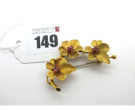 Richard Hans Becker; A Vintage 18ct Gold Ruby Set Leaf Brooch, of textured finish with claw set highlights (8.7grams). 