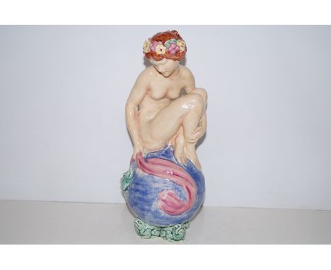 John Broad for Lambeth Doulton 'The Bather', modelled as a nude surmounting a globe with lizard and stylised triform base, im