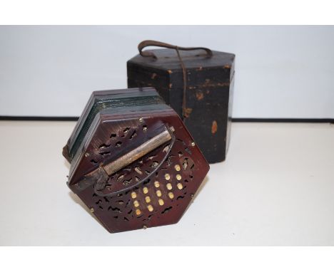 Late 19th century 31 key concertina, fretwork ends with bone keys playing G/D, (additional information from vendor, this inst