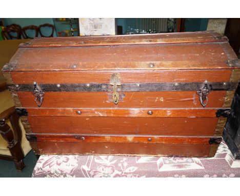 Vintage rexine and wooden bound dome top trunk, height 51cm, width 84cm, depth 44cm